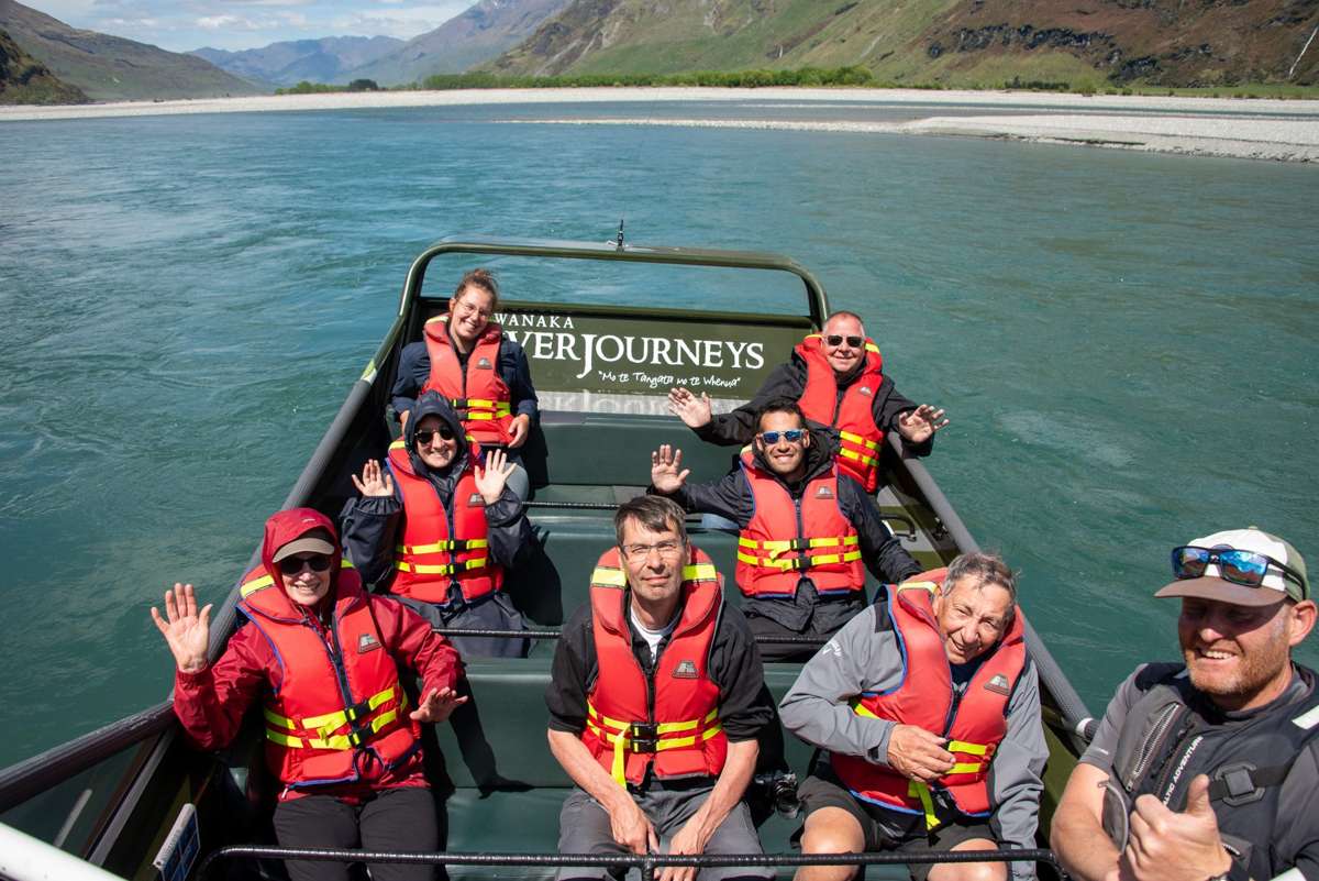 Guests on the Wanaka River Journeys jet boat on the Matukituki River, Mount Aspiring National Park